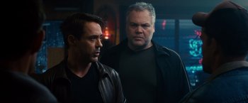 Movie still from “The Judge” (2014), directed by David Dobkin – Two men standing next to each other in a dark room; Close Up shot, Over the shoulder angle