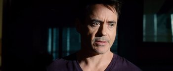 Movie still from “The Judge” (2014), directed by David Dobkin – A person wearing a purple shirt; Close Up shot, Over the shoulder angle