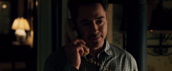 Movie still from “The Judge” (2014), directed by David Dobkin – A person talking on a cell phone; Close Up shot, Over the shoulder angle