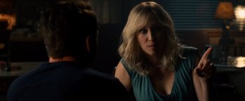 Movie still from “The Judge” (2014), directed by David Dobkin – A woman sitting next to a man in a room; Close Up shot, Over the shoulder angle