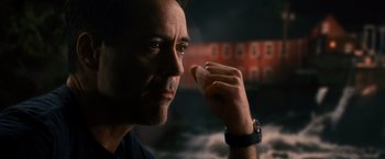 Movie still from “The Judge” (2014), directed by David Dobkin – A person holding something in his hand; Close Up shot, Over the shoulder angle