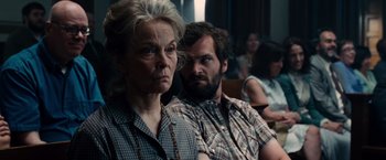 Movie still from “The Judge” (2014), directed by David Dobkin – A woman and a man sitting next to each other in a room; Close Up shot, Over the shoulder angle