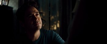 Movie still from “The Judge” (2014), directed by David Dobkin – A person sitting in front of a window; Close Up shot, Over the shoulder angle