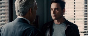 Movie still from “The Judge” (2014), directed by David Dobkin – A man standing next to another man in front of a mirror; Close Up shot, Over the shoulder angle