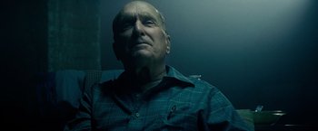 Movie still from “The Judge” (2014), directed by David Dobkin – An older man is looking up into the sky; Close Up shot, Low angle