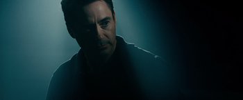 Movie still from “The Judge” (2014), directed by David Dobkin – A person in a dark room; Close Up shot, Over the shoulder angle