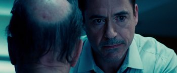 Movie still from “The Judge” (2014), directed by David Dobkin – A man's face as he stares at the camera; Close Up shot, Over the shoulder angle