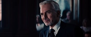 Movie still from “The Judge” (2014), directed by David Dobkin – An older man in a black suit and white beard; Close Up shot, Over the shoulder angle