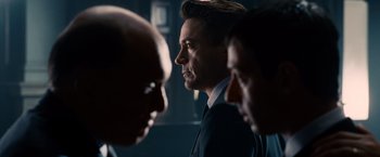 Movie still from “The Judge” (2014), directed by David Dobkin – A group of men standing next to each other in a room; Close Up shot, Over the shoulder angle