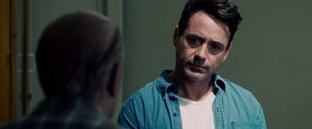 Movie still from “The Judge” (2014), directed by David Dobkin – A person looking at a mirror; Close Up shot, Over the shoulder angle