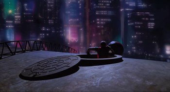 Movie still from “Batman Forever” (1995), directed by Joel Schumacher – An image of an animated scene of a city at night; Extreme Wide shot, High angle