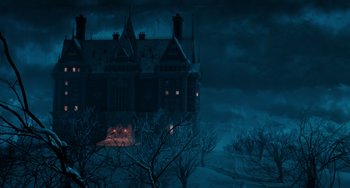 Movie still from “Batman Returns” (1992), directed by Tim Burton – An old house in the middle of the night; Extreme Wide shot, High angle