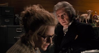 Movie still from “Batman Returns” (1992), directed by Tim Burton – A man and a woman looking at each other in a room; Close Up shot, Over the shoulder angle