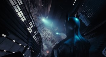 Movie still from “Batman Returns” (1992), directed by Tim Burton – A view from the top of a building looking down at a city at night; Extreme Wide shot, Overhead angle