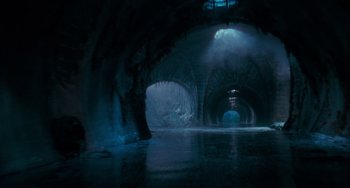 Movie still from “Batman Returns” (1992), directed by Tim Burton – A view of a tunnel in the middle of the night; Extreme Wide shot, Low angle