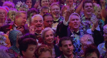 Movie still from “Batman & Robin” (1997), directed by Joel Schumacher – A group of people that are standing in a room; Medium shot, High angle