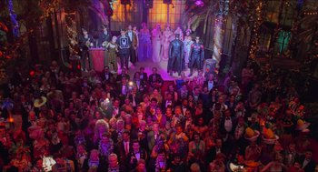 Movie still from “Batman & Robin” (1997), directed by Joel Schumacher – A crowd of people in costumes at an event; Extreme Wide shot, High angle
