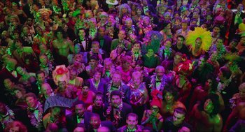 Movie still from “Batman & Robin” (1997), directed by Joel Schumacher – A group of people that are standing in a room; Extreme Wide shot, Overhead angle