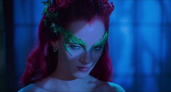 Movie still from “Batman & Robin” (1997), directed by Joel Schumacher – A person wearing a costume; Close Up shot, Over the shoulder angle