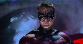 Movie still from “Batman & Robin” (1997), directed by Joel Schumacher – A person wearing a costume; Close Up shot, Low angle