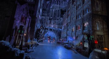 Movie still from “Batman & Robin” (1997), directed by Joel Schumacher – A street scene with a lot of lights on the street; Extreme Wide shot, High angle