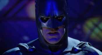 Movie still from “Batman & Robin” (1997), directed by Joel Schumacher – A person wearing a batman mask; Close Up shot, Low angle