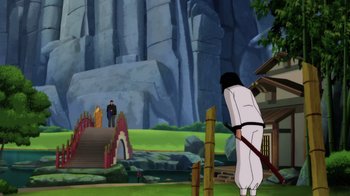 Movie still from “Batman: Soul of the Dragon” (2021), directed by Sam Liu – An animated scene of a man standing in front of a mountain; Extreme Wide shot, Over the shoulder angle