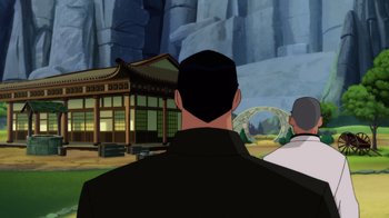Movie still from “Batman: Soul of the Dragon” (2021), directed by Sam Liu – A man standing in front of a building with mountains in the background; Medium shot, Over the shoulder angle
