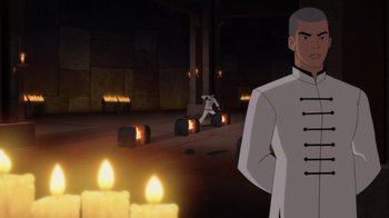 Movie still from “Batman: Soul of the Dragon” (2021), directed by Sam Liu – An animated scene of a man in a white suit and candles in the background; Medium shot, Over the shoulder angle