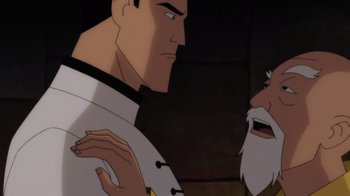 Movie still from “Batman: Soul of the Dragon” (2021), directed by Sam Liu – A man with a white shirt and a white beard is talking to another man with a white shirt; Close Up shot, Over the shoulder angle