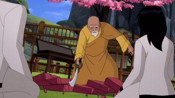 Movie still from “Batman: Soul of the Dragon” (2021), directed by Sam Liu – An old man in a yellow robe is holding a knife; Medium shot, High angle