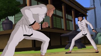 Movie still from “Batman: Soul of the Dragon” (2021), directed by Sam Liu – Two people are fighting in a fighting stance; Wide shot, Over the shoulder angle