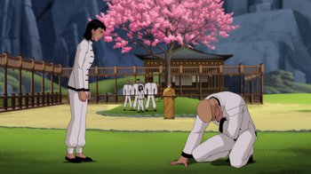 Movie still from “Batman: Soul of the Dragon” (2021), directed by Sam Liu – An animated scene of a man kneeling down in front of a group of people; Wide shot, Low angle