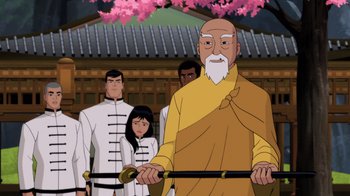 Movie still from “Batman: Soul of the Dragon” (2021), directed by Sam Liu – A group of people standing next to each other in front of a building; Medium shot, Over the shoulder angle