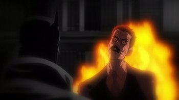 Movie still from “Batman: The Doom That Came to Gotham” (2023), directed by Sam Liu – A man in a suit and a bat in a room; Close Up shot, Over the shoulder angle
