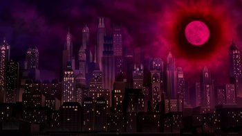Movie still from “Batman: The Doom That Came to Gotham” (2023), directed by Sam Liu – A city skyline with a red sky in the background; Extreme Wide shot, Low angle