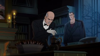 Movie still from “Batman: The Long Halloween” (2021), directed by Chris Palmer – A man in a black suit and white shirt is holding a tea pot; Medium shot, Over the shoulder angle