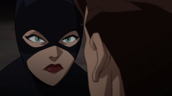 Movie still from “Batman: The Long Halloween” (2021), directed by Chris Palmer – A woman's face in a batman cartoon; Close Up shot, Over the shoulder angle