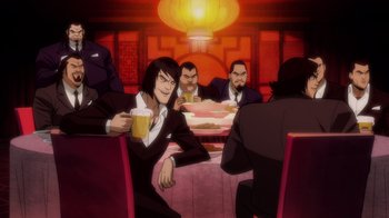 Movie still from “Batman: The Long Halloween” (2021), directed by Chris Palmer – A group of men sitting at a table drinking beer; Medium shot, Over the shoulder angle