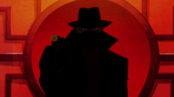 Movie still from “Batman: The Long Halloween” (2021), directed by Chris Palmer – A man in a black coat and a hat holding a gun; Medium shot, Low angle