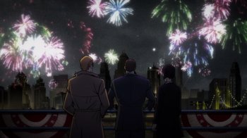Movie still from “Batman: The Long Halloween” (2021), directed by Chris Palmer – A group of people standing in front of fireworks at night; Wide shot, High angle