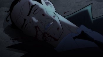 Movie still from “Batman: The Long Halloween” (2021), directed by Chris Palmer – A man with blood all over his face and neck; Extreme Close Up shot, Overhead angle