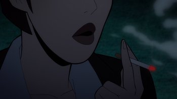 Movie still from “Batman: The Long Halloween” (2021), directed by Chris Palmer – A woman's face with a cigarette in her mouth; Extreme Close Up shot, Low angle