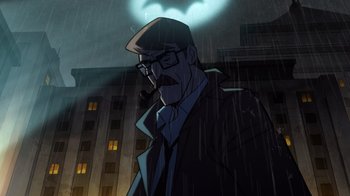 Movie still from “Batman: The Long Halloween, Part Two” (2021), directed by Chris Palmer – A man with a pipe standing in the rain; Close Up shot, Low angle