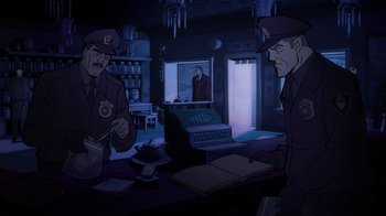 Movie still from “Batman: The Long Halloween, Part Two” (2021), directed by Chris Palmer – Two men in uniforms are standing in a room; Wide shot, High angle
