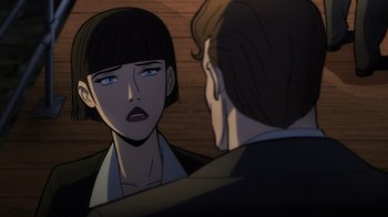 Movie still from “Batman: The Long Halloween, Part Two” (2021), directed by Chris Palmer – A man and a woman looking at one another; Close Up shot, Over the shoulder angle