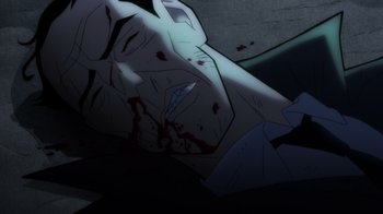 Movie still from “Batman: The Long Halloween, Part Two” (2021), directed by Chris Palmer – A man with blood all over his face and neck; Extreme Close Up shot, Overhead angle