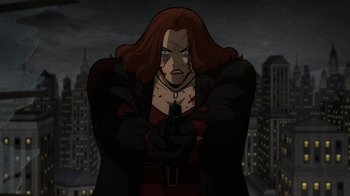 Movie still from “Batman: The Long Halloween, Part Two” (2021), directed by Chris Palmer – An image of an animated character holding a gun; Medium shot, High angle