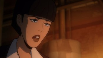 Movie still from “Batman: The Long Halloween, Part Two” (2021), directed by Chris Palmer – An animated picture of a woman with short black hair; Close Up shot, Over the shoulder angle