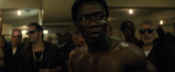 Movie still from “Batman v Superman: Dawn of Justice” (2016), directed by Zack Snyder – A person in a boxing ring; Close Up shot, Over the shoulder angle